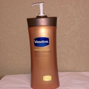 Vaseline Cocoa Butter Deep Conditioning Body Lotion. Cocoa Butter & Vitamin E.
